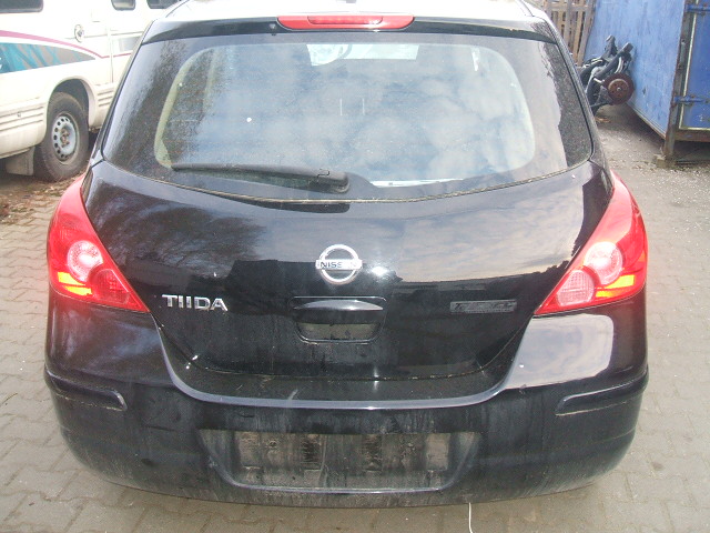 Nissan - Tiida - 4 drzwi - (2007-) - Zawieszenie / McPherson przedni prawy