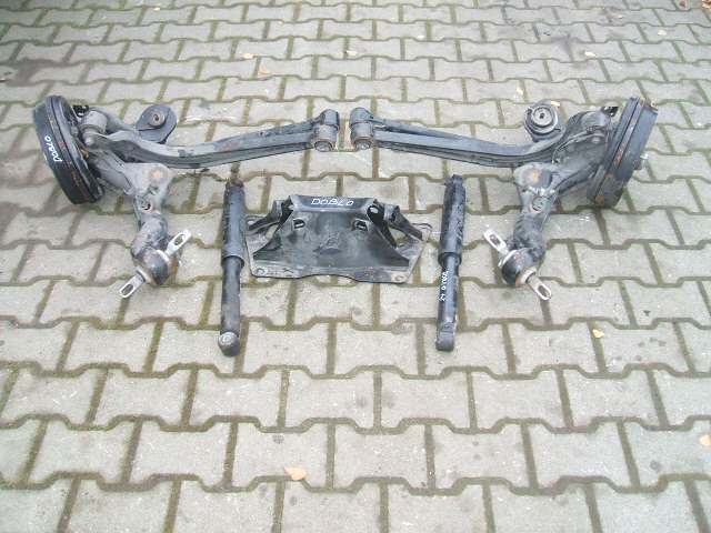 Fiat - Doblo - Kombi - (2010-) - Zawieszenie / Amortyzator tylny lewy