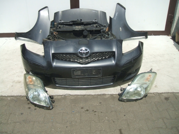 Toyota - Yaris - 3 drzwi - (2009 - 2011) - Oświetlenie / Lampa przednia lewa